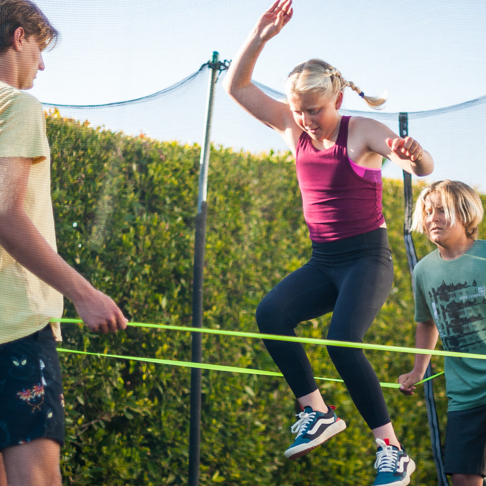 Fun is an understatement! The ATHLETICISM Jump Band is similar to the Chinese Jump Rope. It is a soft, durable, elastic band, while others are rubber. It can be used for all ages. It is best used with two friends with the band around their legs as the third person jumps. 